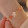 Redgusset colour alloy bracelet for women with a sweet style and a central star charm.