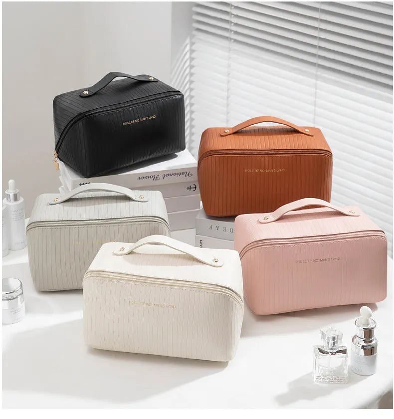 Beige cubic makeup bag with vertical pattern design showing 22.5cm height, 12.5cm width dimensions
