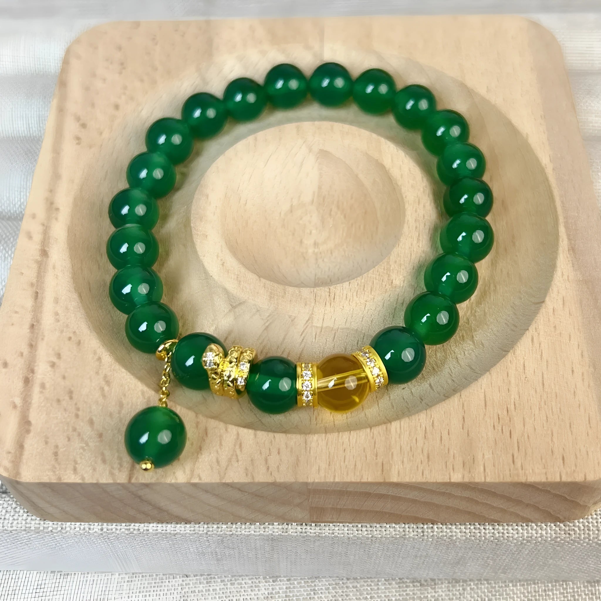 Green chalcedony and red agate roll wealth snake bracelet with copper fittings on wrist