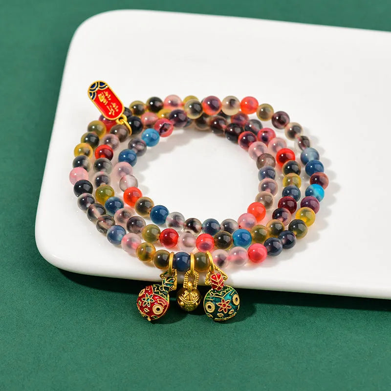 Handmade Dzogchen Agate bracelet with Sugar Heart Fragrant Gray glaze and Swallowing Gold Beast detail.