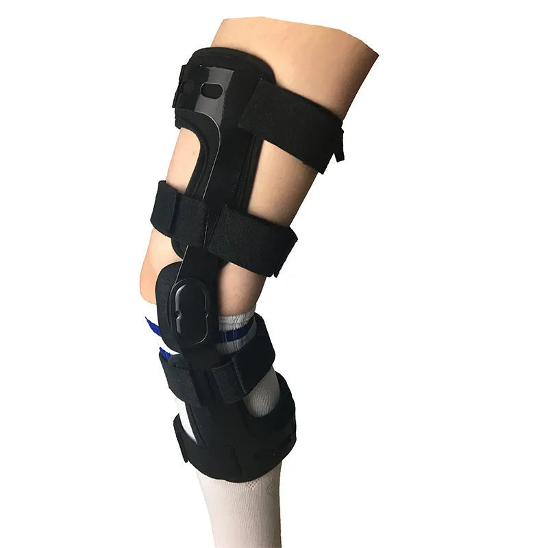 Black anterior ligament knee pad with adjustable straps, showing brushed cloth interior and sandwich fabric construction