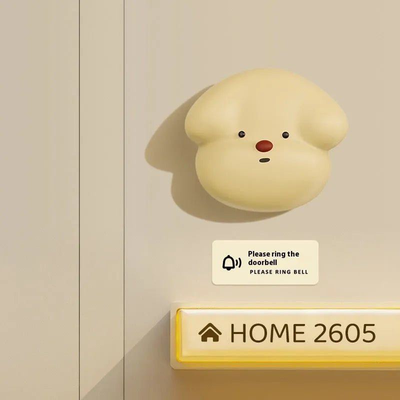 Wireless plug-in doorbell in milky yellow colour with compact design for household use