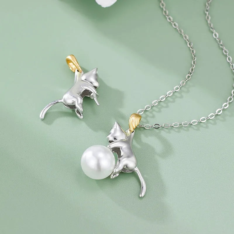 925 sterling silver clavicle chain with cat charm and electroplated finish, showing pearl bead option