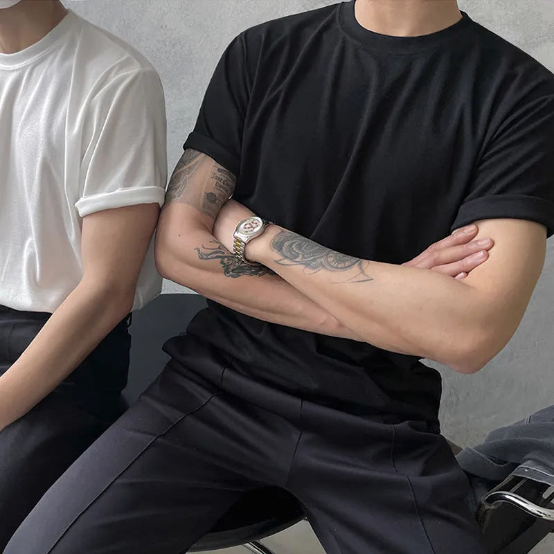 Men's slim fit cotton t-shirt in black or white with half-sleeve round neck design on hanger