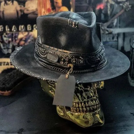 Handmade wool felt skull hat with conical crown showing integrated skull pattern design
