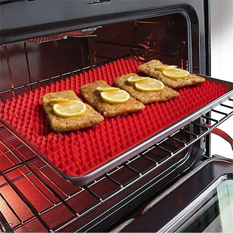 Red silicone pyramid cooking mat with grid pattern for oven and BBQ use