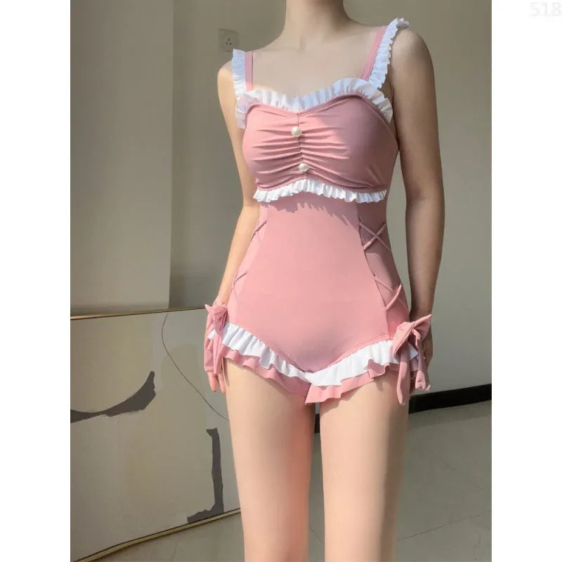 Women's solid pink one-piece sleeveless swimsuit made from milk silk fabric