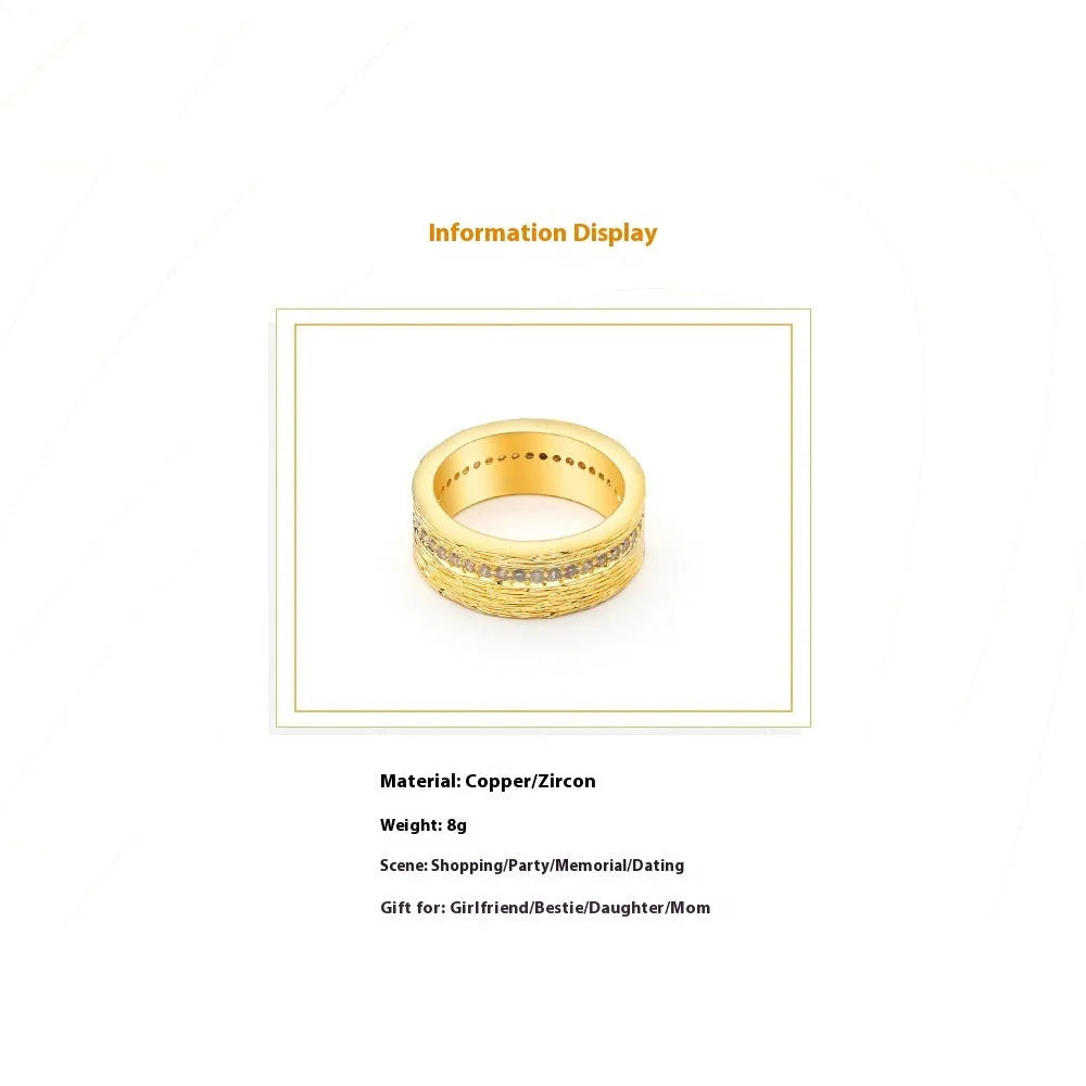 Gold geometric women's ring with zircon stone, showing clean lines and symmetrical design on hand