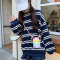 Soft plush baomaoxian mobile phone charm with floral decoration and a shoulder strap.