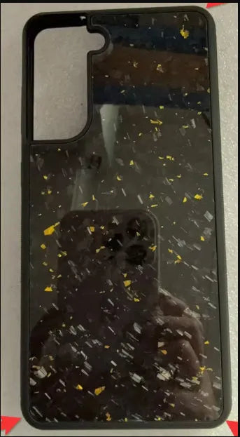 Samsung Galaxy phone case in Forged Red colour, showing aramid fibre texture and slim fit on a phone