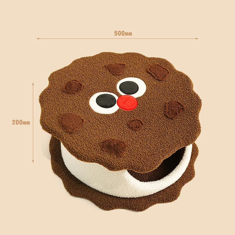 Khaki coloured cat nest bed shaped like a sandwich cookie, showing enclosed house design.