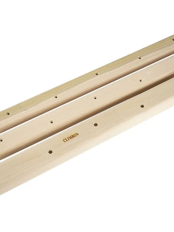 Three wooden hangboards for grip strength training in 12cm, 40cm, and 50cm sizes with multiple edge depths