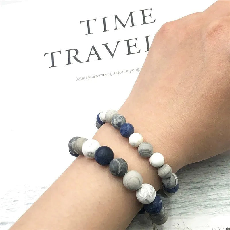 Handmade planet stone bracelet with universe wind pattern showing U-shaped design