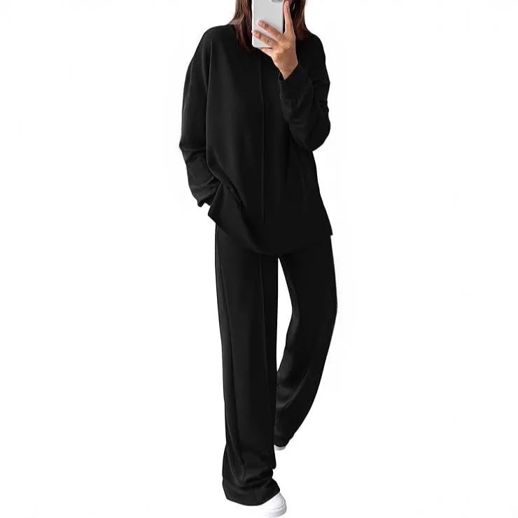 Women's polyester jogging suit set in Army Green, showing long-sleeve top and matching trousers.