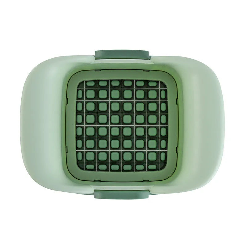 Green manual vegetable chopper with stainless steel blades for slicing onions, potatoes and cucumbers