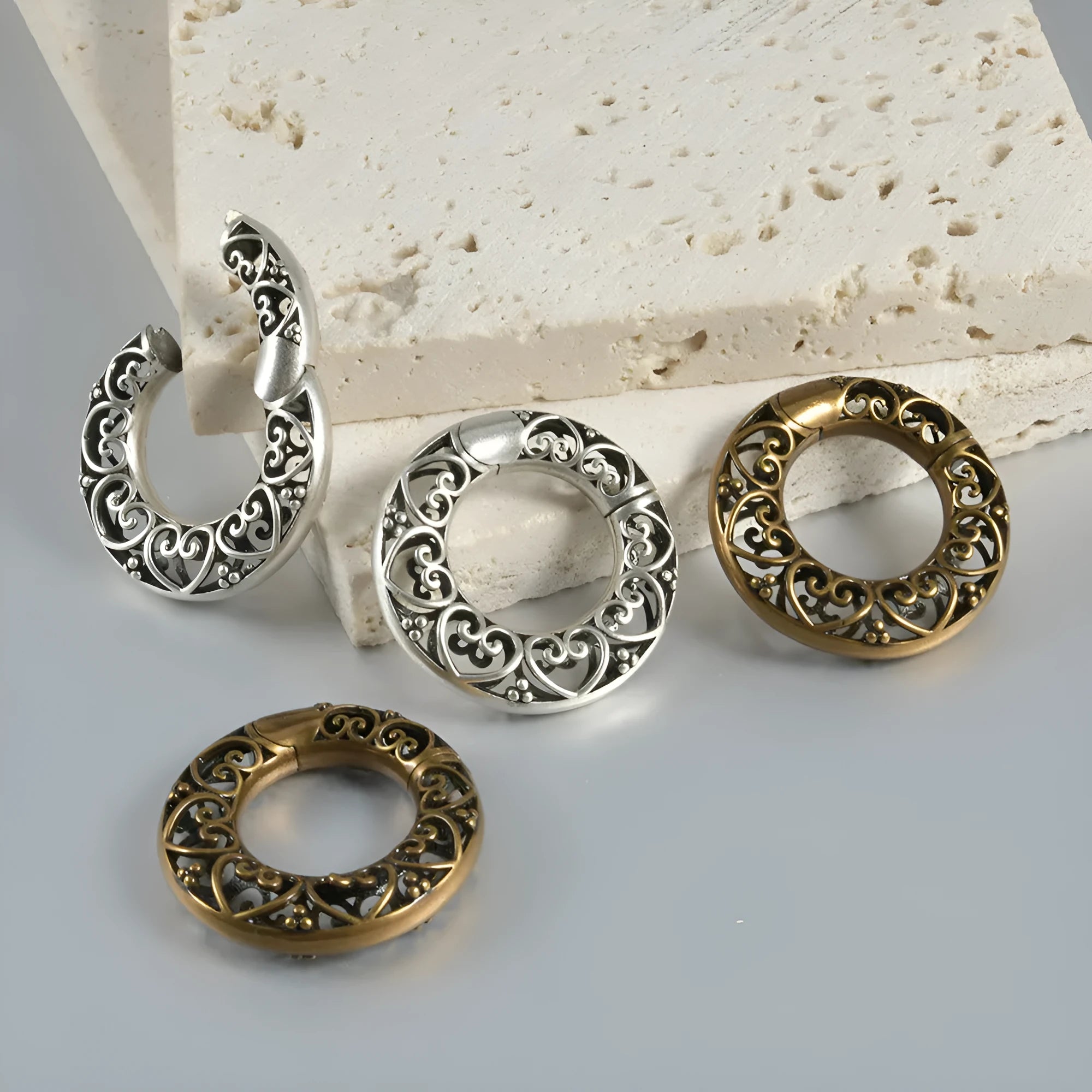 Retro geometric magnetic earrings with hollow heart and lotus shapes in polished stainless steel
