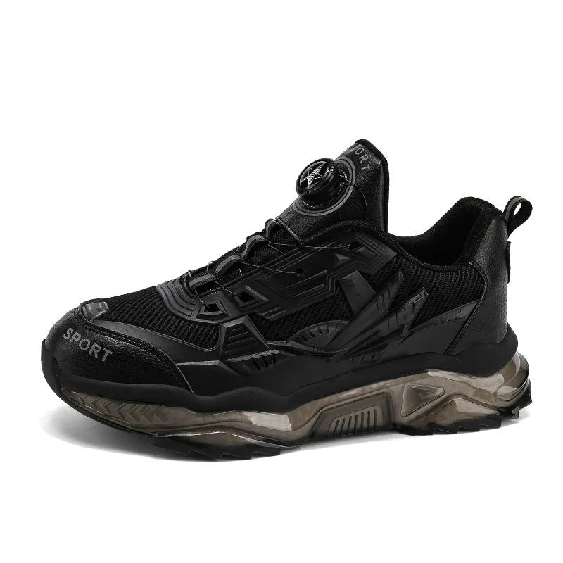 Men's black rotating button dad shoes with mesh upper and non-slip sole on wooden surface