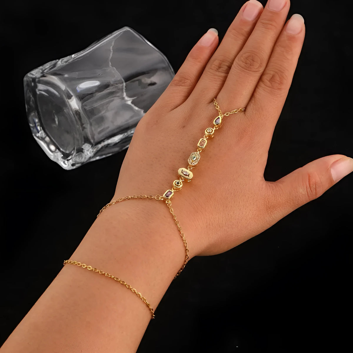 Titanium steel tassel rhinestone finger chain bracelet in drop shape, gold or silver colour options