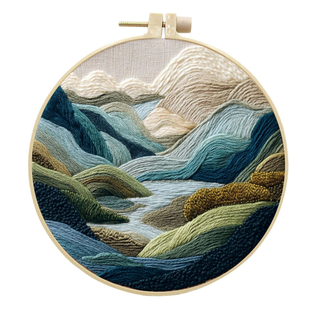 Embroidery DIY landscape kit with bamboo-style frame, pre-printed cotton fabric, embroidery threads, and needles