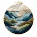 Embroidery DIY landscape kit with bamboo-style frame, pre-printed cotton fabric, embroidery threads, and needles