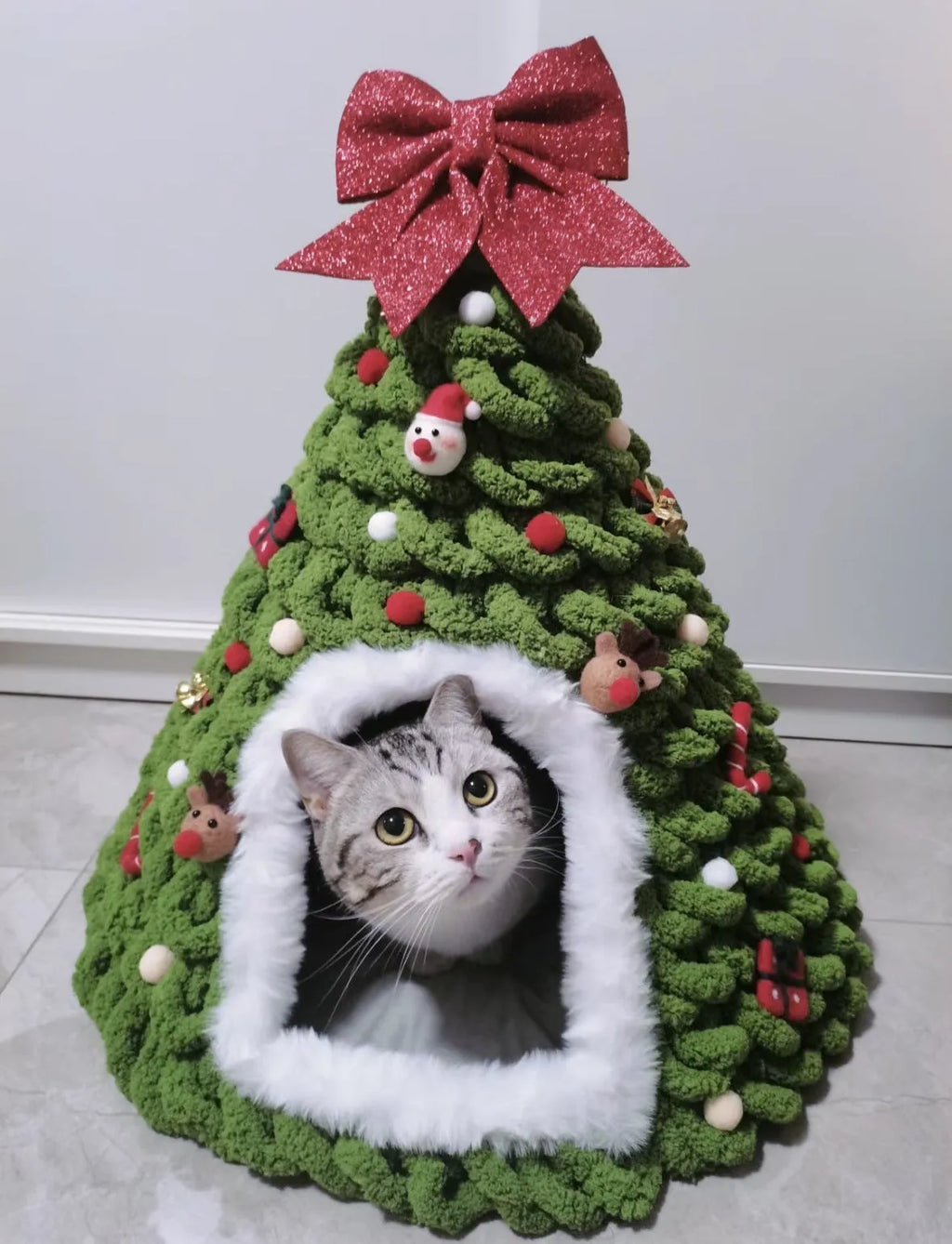 Grey conical felt cat house for indoor cats under 12 pounds.