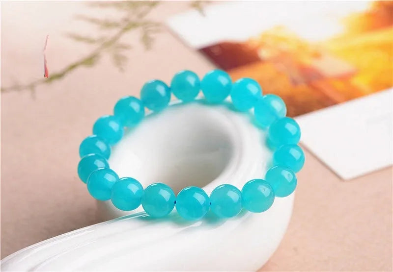 Grade 7A Amazonite scattered beads showing blue-green natural gemstone with polished surfaces for jewellery making