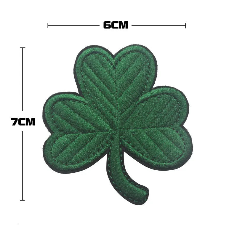 Embroidered fabric badge with Velcro backing showing detailed stitching on nylon polyester material