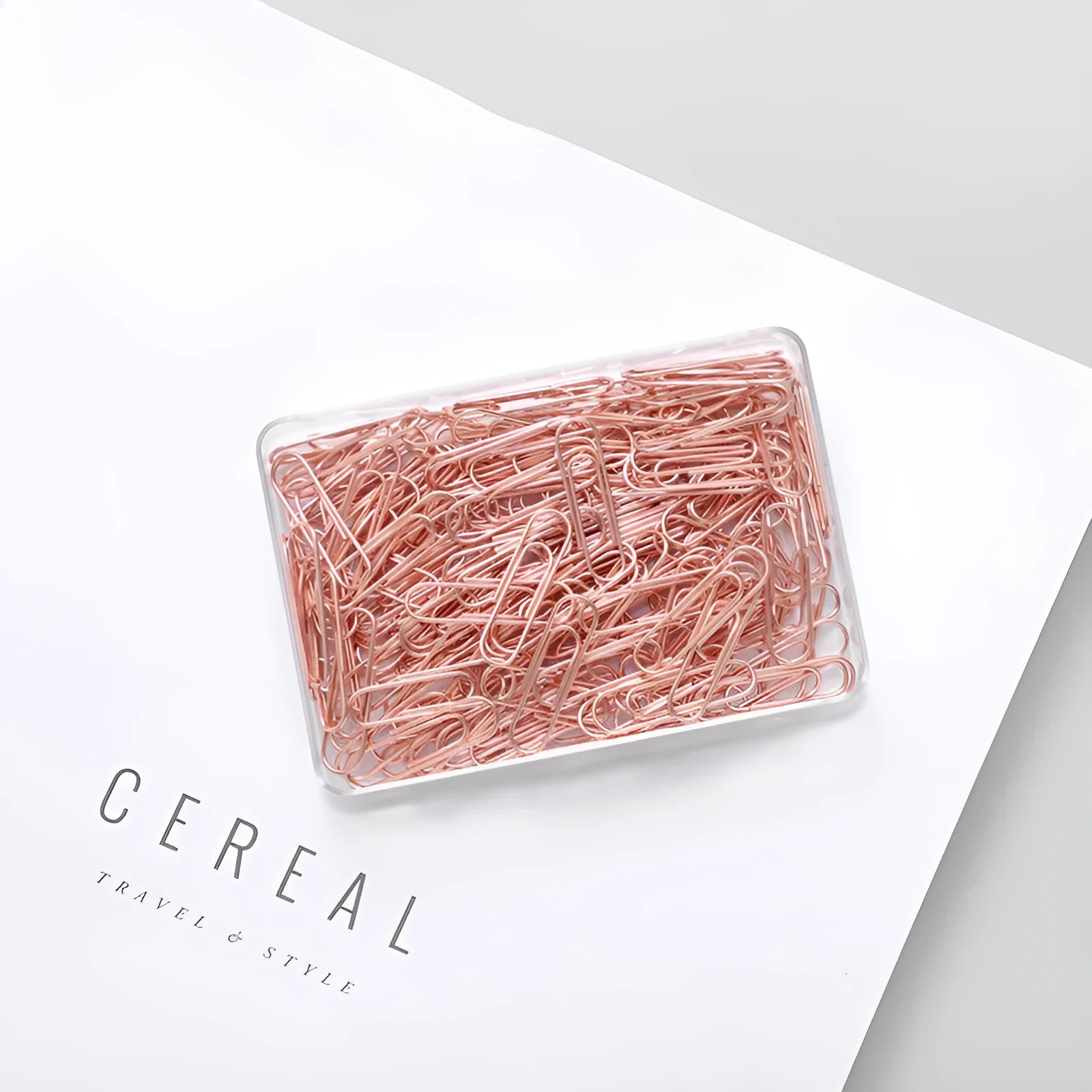 Rose gold coloured heart-shaped metal paper clips, 28mm size, in a box of 100 pieces.