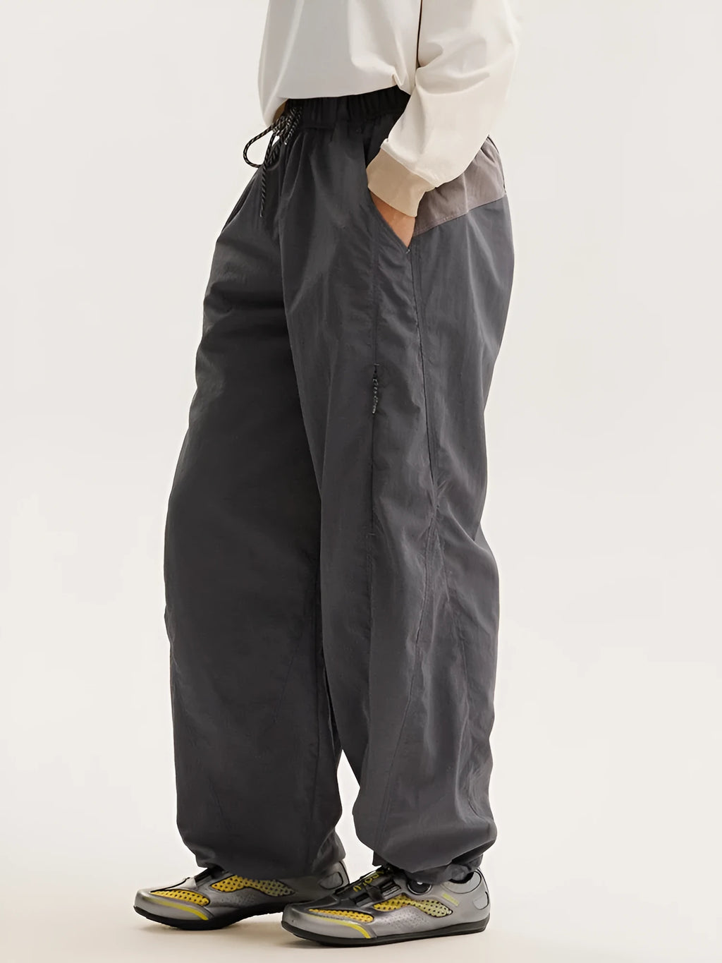 Fleece-lined quick-dry paratrooper cargo pants in army green with cargo pockets and adjustable ankle cuffs.