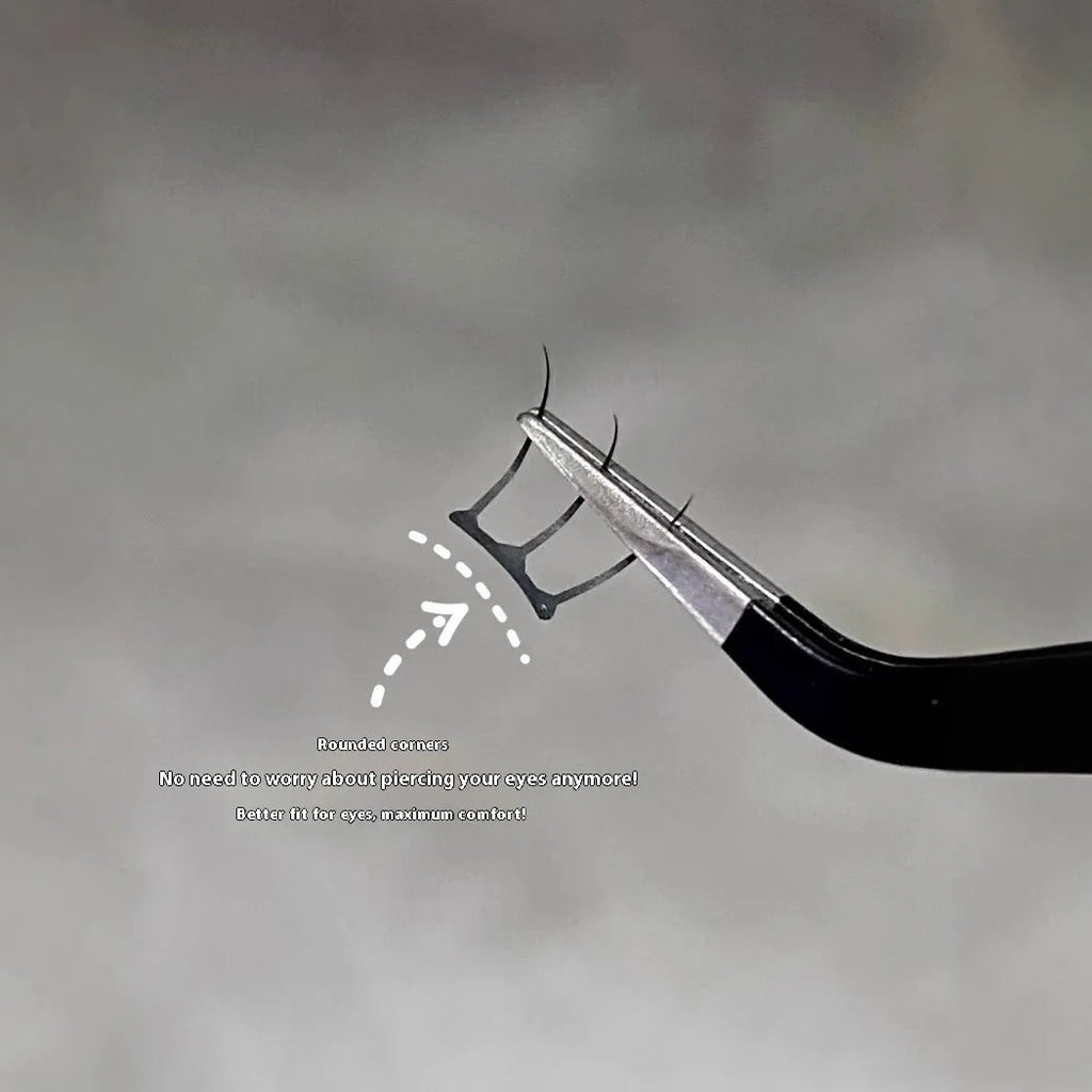 Pack of reusable false eyelash clusters made from black artificial fibre on a clear plastic tray.