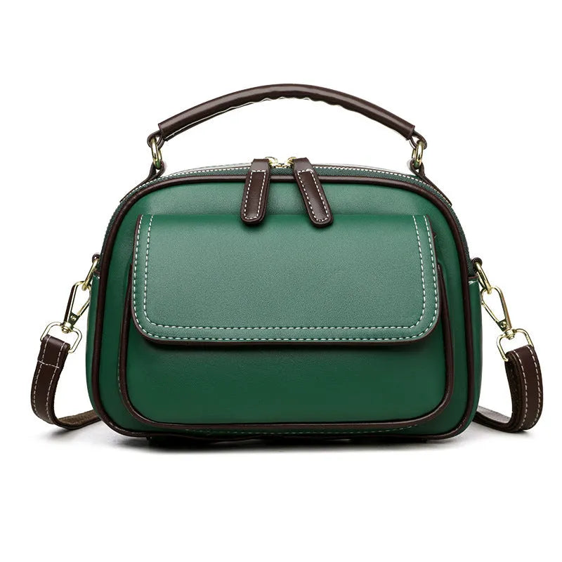Women's square cross-body shoulder bag in black, green, or orange with double shoulder straps