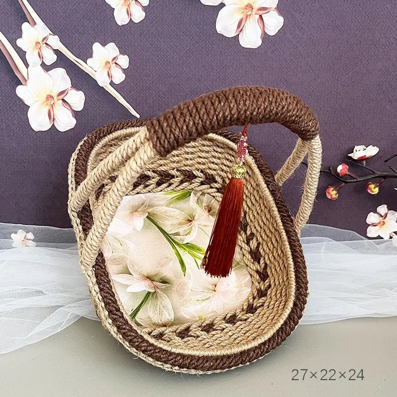 Hand-woven hemp rope basket in coffee brown measuring 19cm by 12cm with natural straw texture