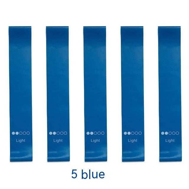 Five colour-coded TPE yoga tension straps with force marks arranged by thickness from 0.5mm to 1.1mm