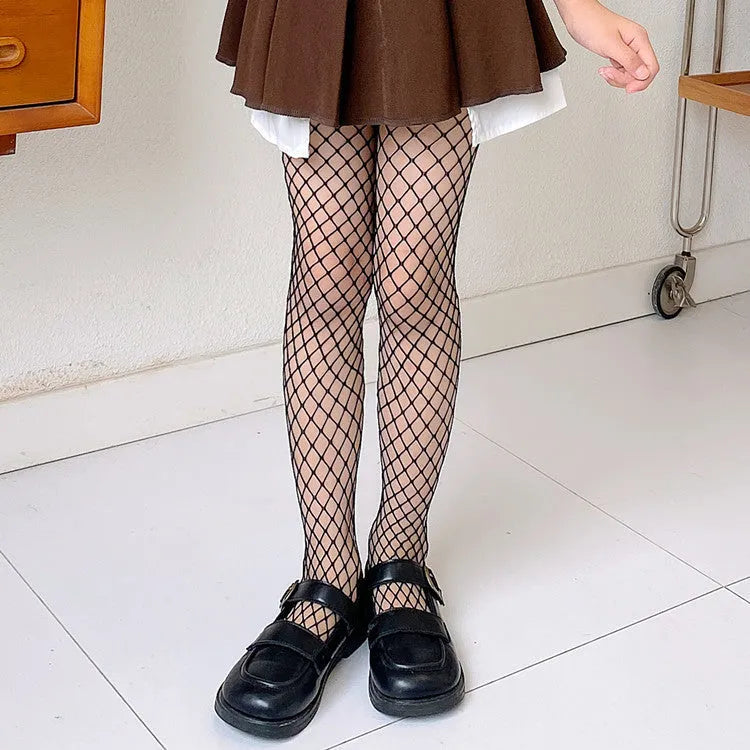 Women's mesh stockings showing large, medium and small net patterns in black and white colours on leg