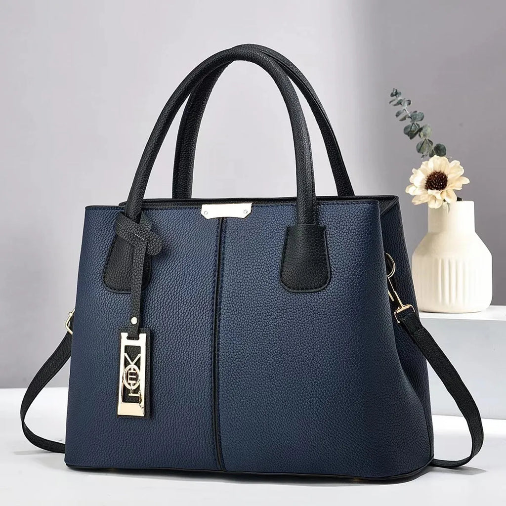 Soft PU leather large capacity shoulder handbag for women shown in a choice of colours.