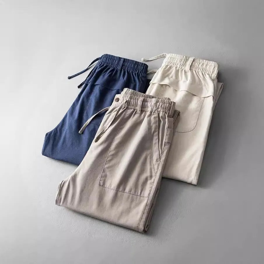 Men's linen casual trousers in navy blue, apricot, or grey with mid waist design
