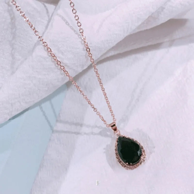 Water drop rose gold rhinestone necklace with adjustable chain and geometric pendant in multiple colours