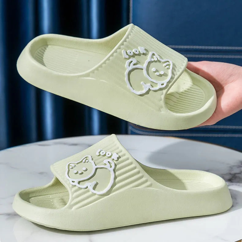 Green cat-themed thick platform sliders with a non-slip EVA sole on a white background.
