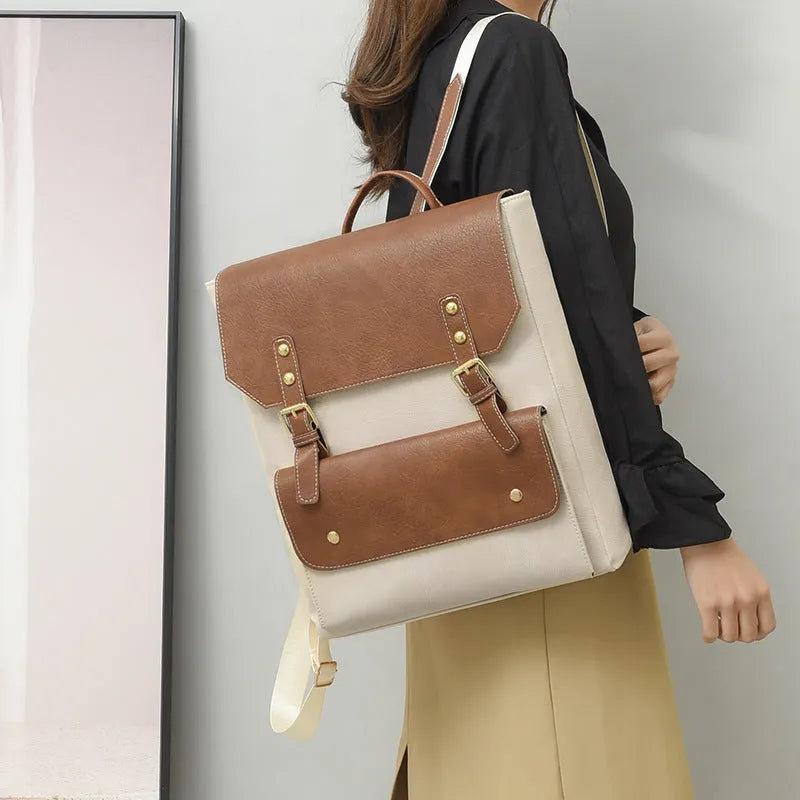 Korean style retro backpack in soft PU material with ventilation features and burden reduction design