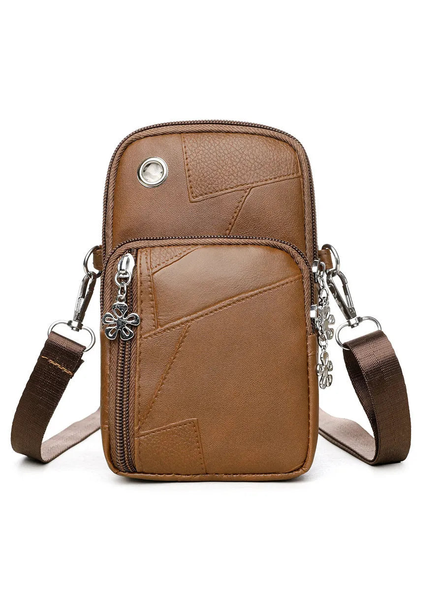 Mini vertical phone crossbody bag in PU leather with sandwich pockets, shown in available colours