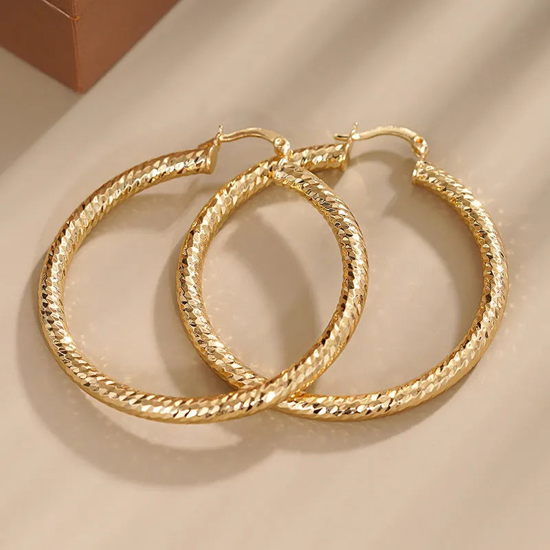 Geometric ring design ear clip earrings in copper with electroplated finish
