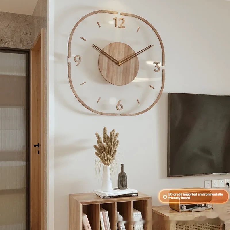 Modern square wooden wall clock with transparent frame on a wall.