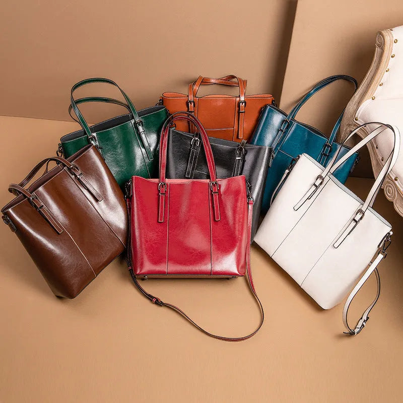 Brown genuine leather women's retro shoulder bag with three strap options and organised interior compartments