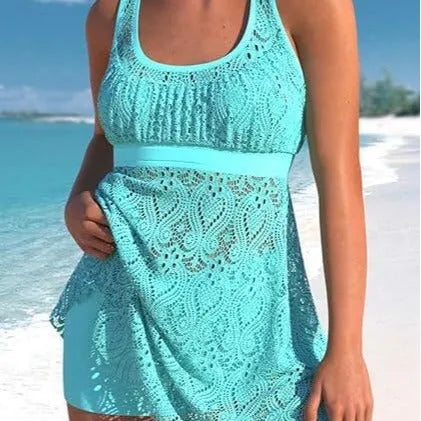 Women's two-piece swimwear set in solid colour with conservative split design, sleeveless top and briefs for swimming