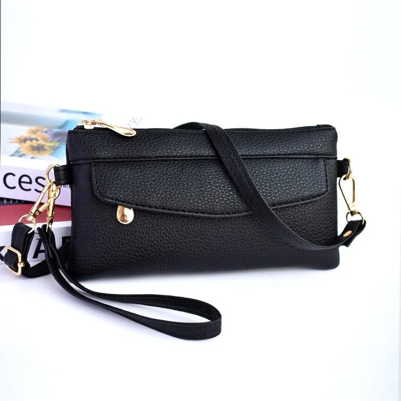 Soft PU leather crossbody bag in pine leaf green with a horizontal square shape and shoulder strap