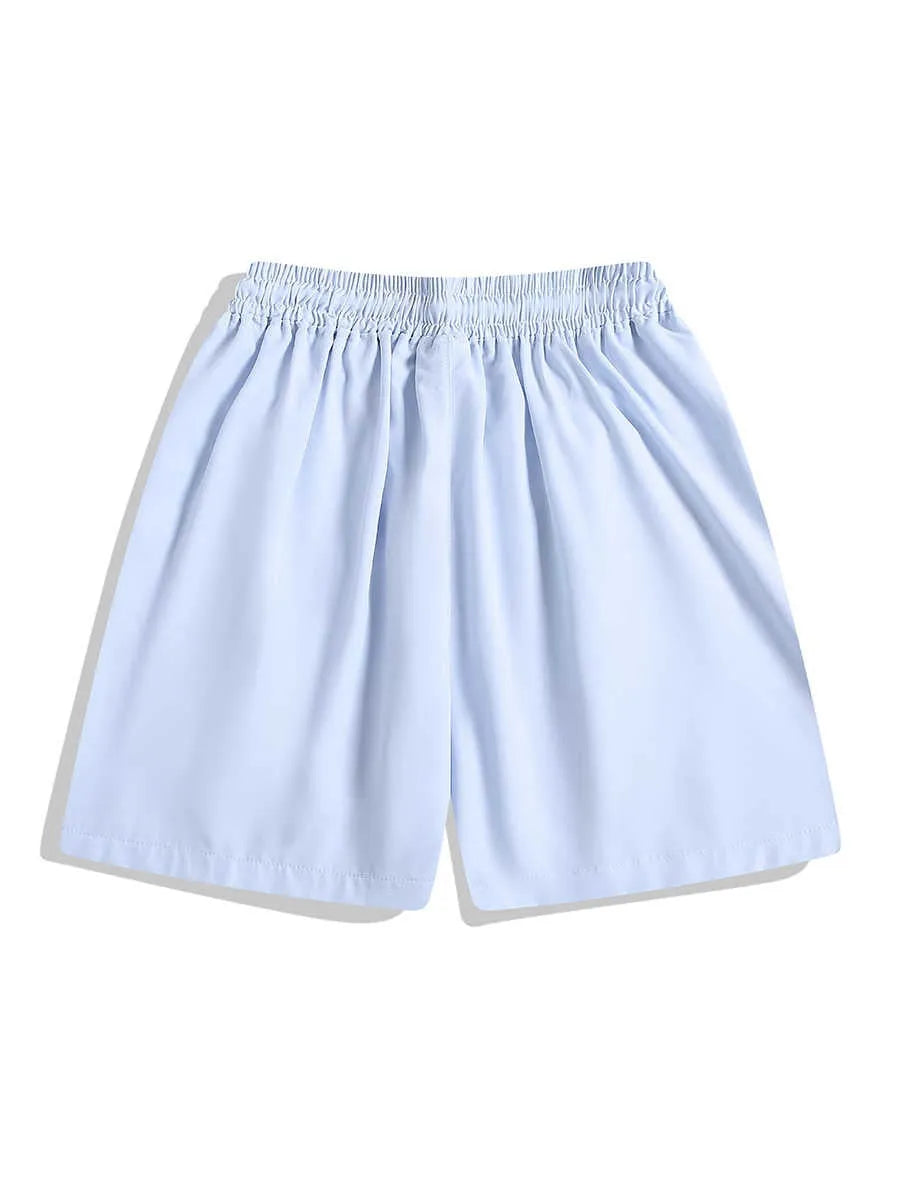 Loose-fit quick-drying sports shorts in black with elastic waistband and above-knee length