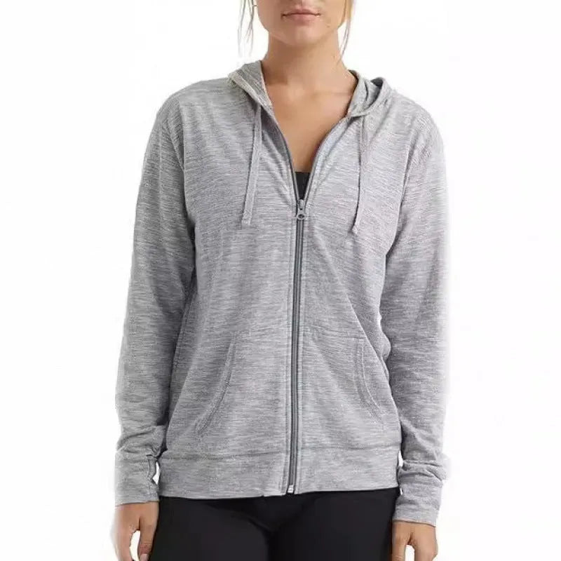 Loose-fit solid colour pullover hoodie with a hood and long sleeves, shown in grey.