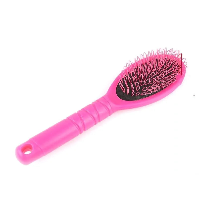 Black and pink ring tooth airbag comb for hair extensions on a white background
