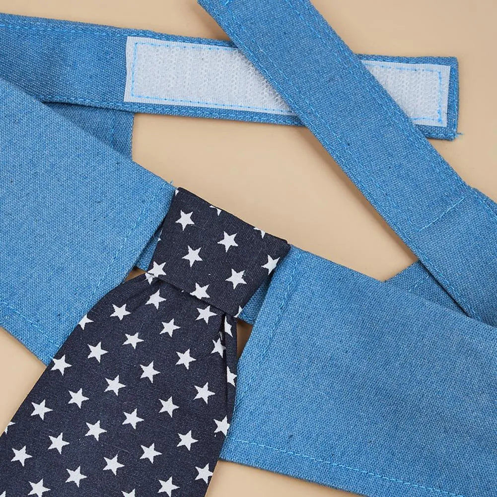 Blue denim dog collar with an adjustable fastener and a choice of bow tie or necktie in a star pattern.