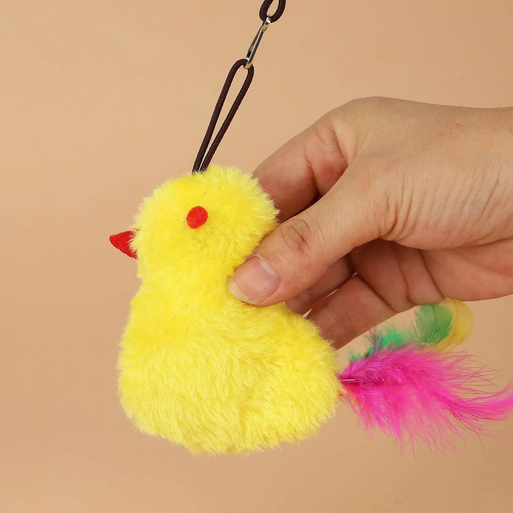 Interactive hanging cat toy with retractable elastic rope and treat reward bulb mounted on door frame